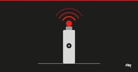 Flat vector graphic on a dark dotted background: a light gray emergency call pillar with a dark call button stands on a gray ground line, topped by a solid red beacon with three nested red arcs radiating upward.