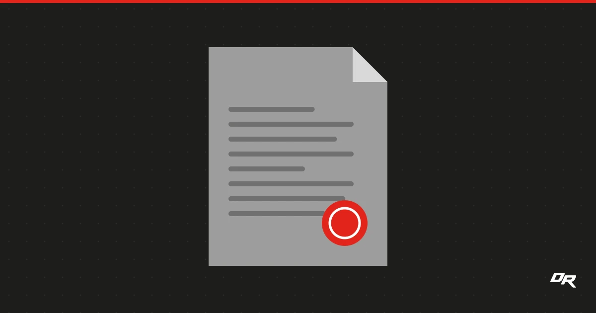 A gray document with a folded corner and horizontal text rules, stamped with a solid red circle in its lower right, on a dark background.